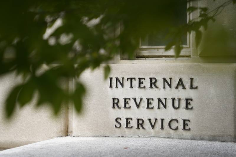 FILE - A sign is displayed outside the Internal Revenue Service building May 4, 2021, in Washington. On Friday, Aug. 19, 2022. (AP Photo/Patrick Semansky, File)