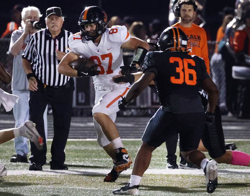 Lincoln-Way West's Thatcher Skwirut tries to get by DeKalb's Kavone Brown during their game Friday, Oct. 3, 2025, at DeKalb High School.