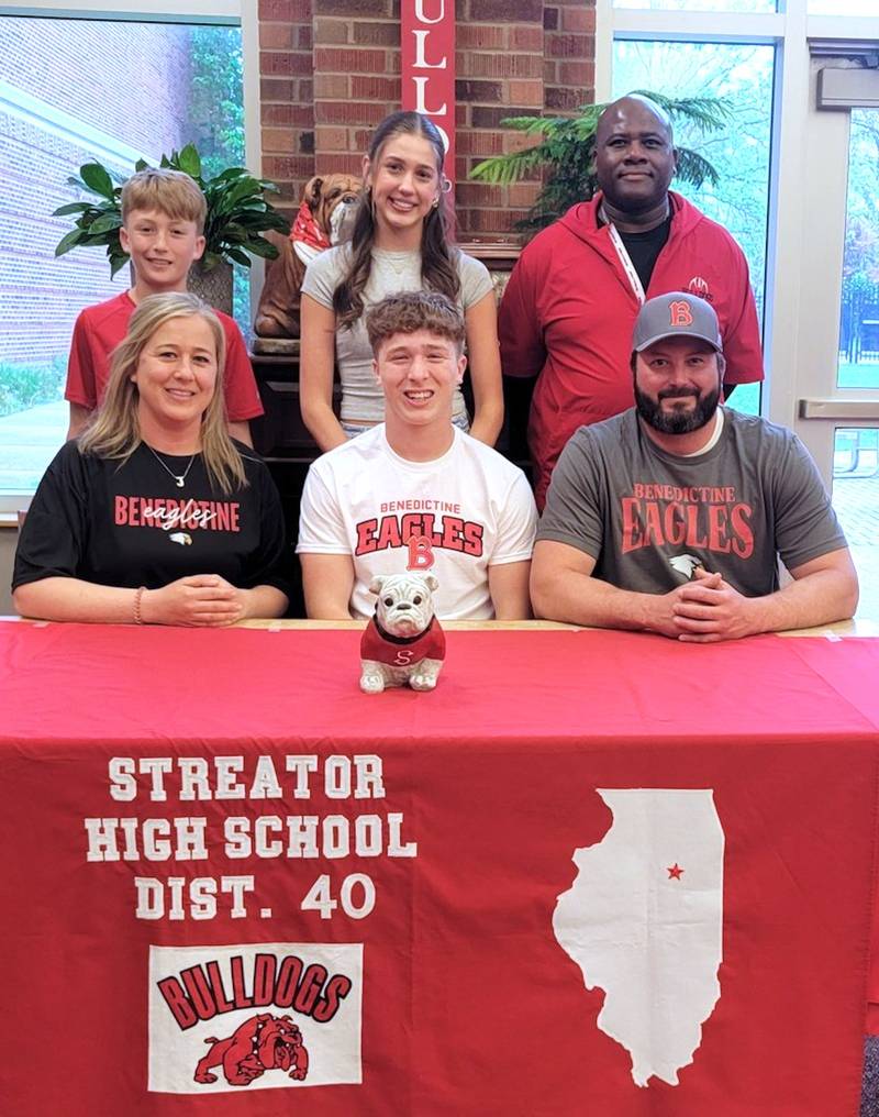 Recent Streator graduate and Times All-Area Football first-teamer Isaiah Weibel signed on to continue his education at Benedictine University in Lisle and his football career at the NCAA Division III level with the Eagles. Pictured at his signing ceremony are (left to right): in front – Jessica, Isaiah and Mike Weibel; and in back – Kash Weibel, Ella Park and Streator assistant coach the late Ed Lewis.