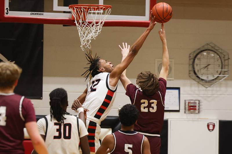 Bolingbrook’s Aries Hull blocks a shot against Lockport on Friday, February 10th.