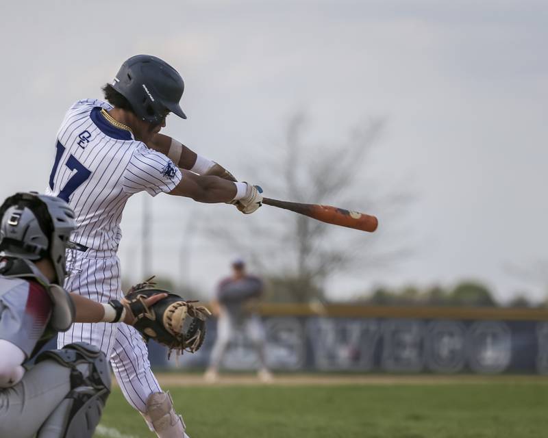 Oswego East's Jacsen Tucker (17) swings at a pitch during baseball game between Plainfield North at Oswego East, Monday, April 28, 2025 in Oswego.