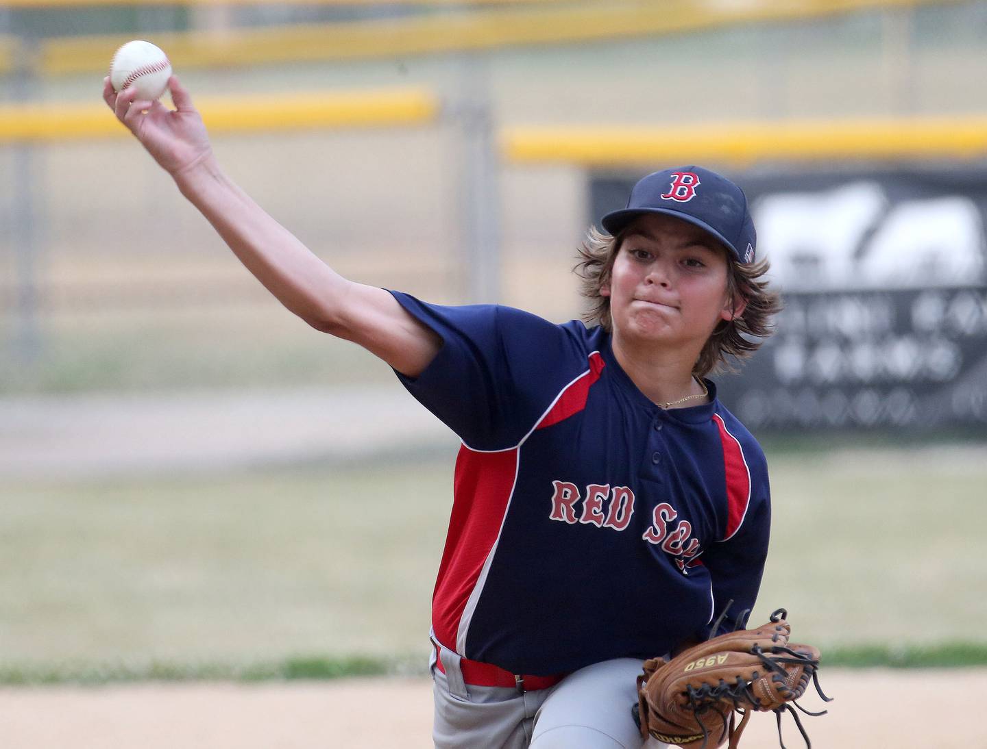 Thrush Sanitation Red Sox's Brodie Martin delivers a pitch to Frostbyte MSP Rangers in the Ottawa Little League baseball (12U) City Championship on Friday, June 23, 2023 at Varland Park in Ottawa.
