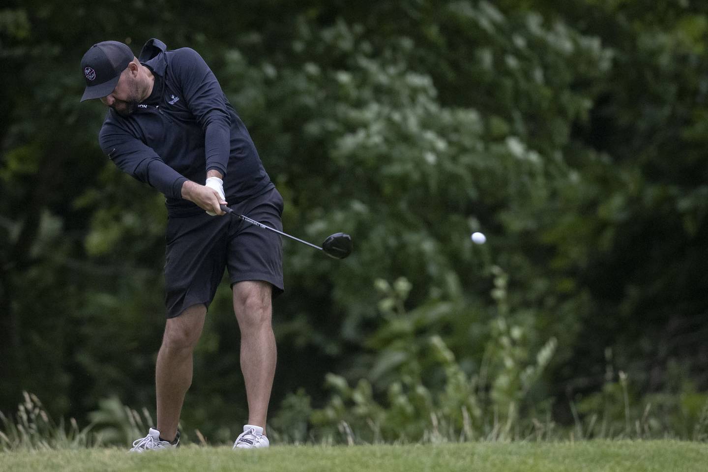 Jesse Cavanaugh drives off the second tee during the 75th annual Pine Hills Invitational golf tournament June 2023 in Ottawa.