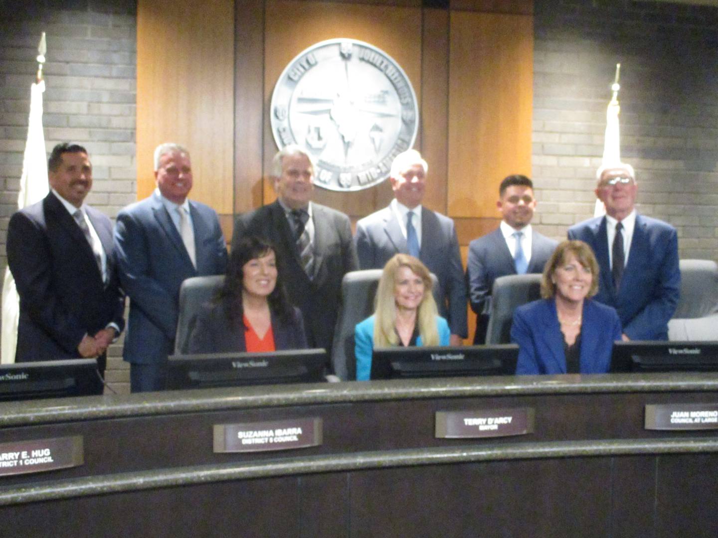 The Joliet City Council poses for a group photo Monday after winners from the April 1 election for three at-large council seats were sworn into office. May 5, 2025