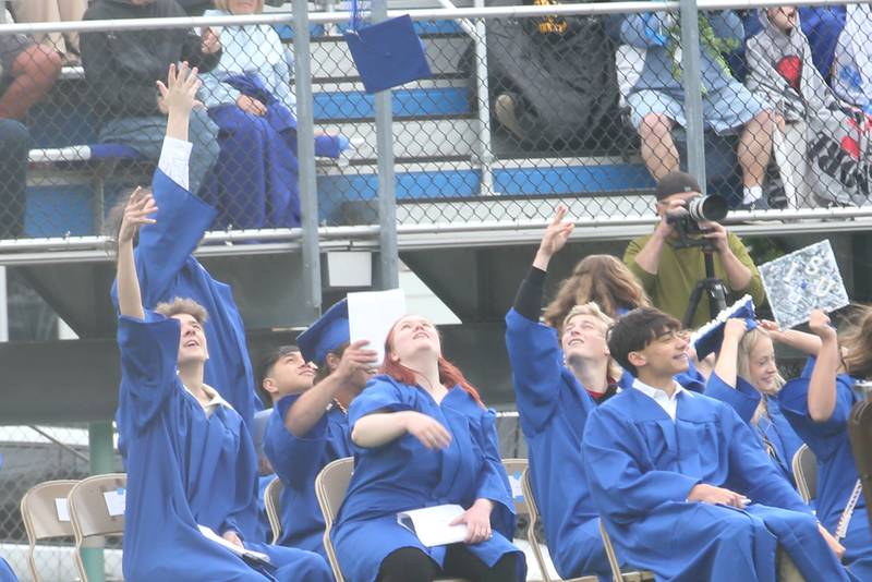 Princeton graduates throw their caps in the air during the 156th annual Commencement on Saturday, May 17, 2025 at Bryant Field.