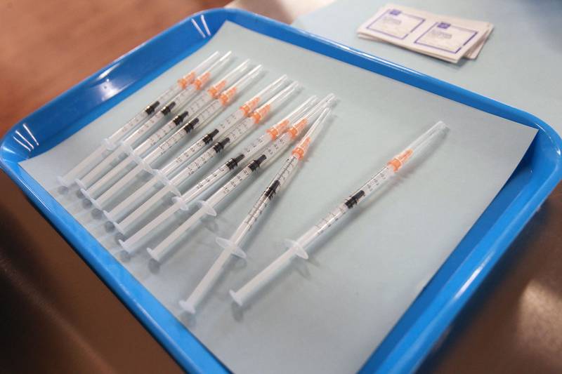 Covid-19 vaccine syringes sit on a tray ready to be used during a vaccination event at the Schreiber Center for Human Services in Round Lake. The event was sponsored by the Lake County Health Department, Catholic Charities and the Doctors Test Centers. Every Saturday from 10-4 p.m. vaccinations will be available by appointment only. (4/10/21)