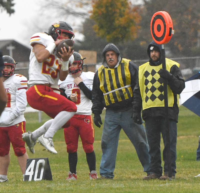 St. Anne's Gavin Threm Romero (23) catches a pass against Polo on Saturday, Nov. 8, 2025 at Polo High School.