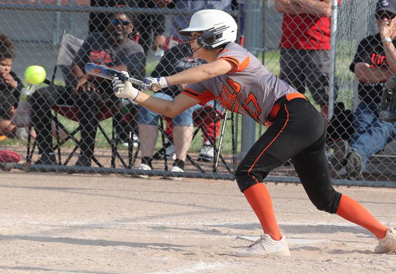 Dekalb's Izzy Aranda gets down a bunt during their Class 4A regional game against Auburn Wednesday, May 24, 2023, at DeKalb High School.