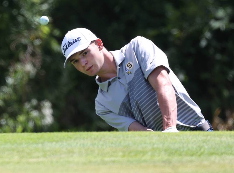 Sterling’s Grant Hartman chips onto the seventh green Monday, Aug. 25, 2025, during the Mark Rolfing Cup at the Kishwaukee Country Club in DeKalb.