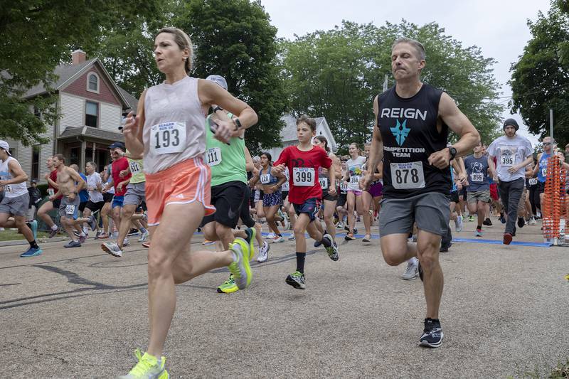 Runners fire out of the gate Saturday, July 1, 2023 at the start of the 23rd annual Reagan Run in Dixon. The 5K starts at the Reagan Boyhood home and ends at Haymarket Square.