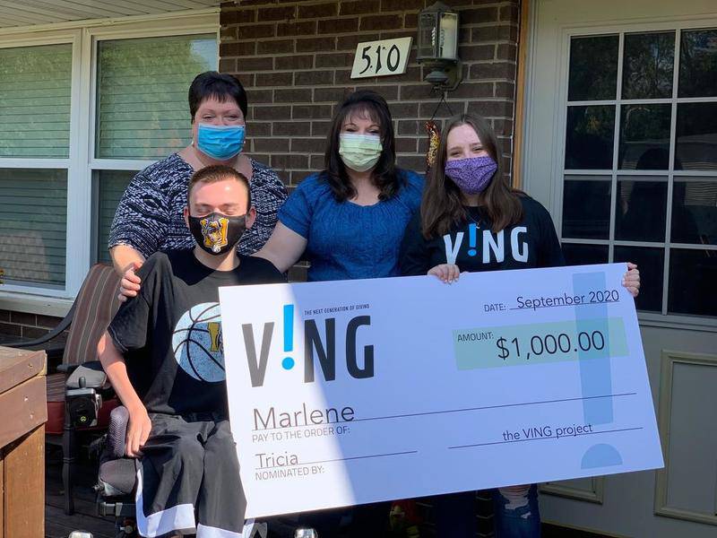 Pictured from left is Lawson Sizemore, Paula Wetstein, Marlene Sizemore and Tricia Wetstein. Last Friday, Tricia surprised Lawson with a donation of $5,000 from the VING Project to help toward the purchase of a van.
