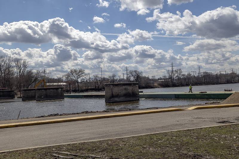 Work continues Wednesday, March 26, 2025, on Project Rock in Dixon’s Page Park. A pedestrian bridge will cross over old railroad supports and improvements trails in the park are being made as well.