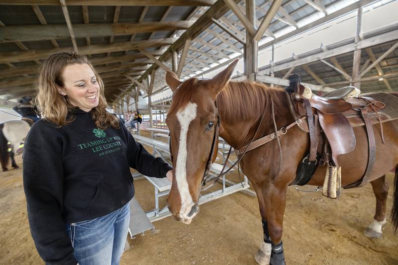 Erin Odle and Alibi of Paw Paw teach kids about equine behaviors Friday, April 25, 2025, during Ag Expo.