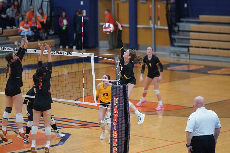 Joliet West's Gabrielle Piazza (7) goes up for a kill against Lincoln-Way West during a class 4A Oswego Sectional semifinal match at Oswego High School on Monday, Oct. 30, 2023.