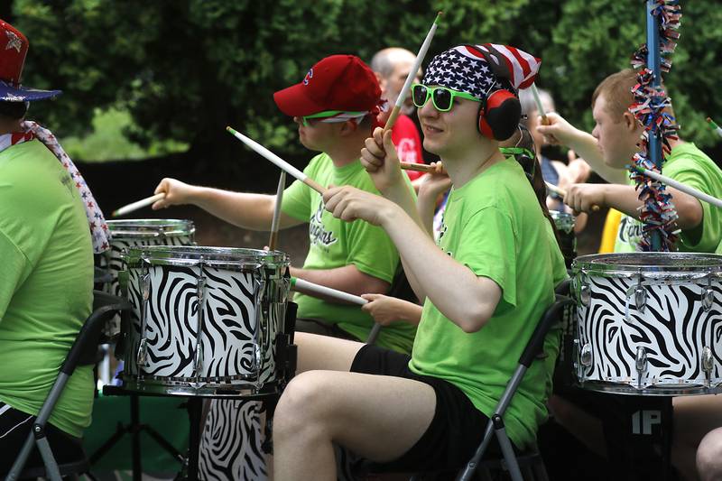 Members of the Kingpins drumlins perform on Sunday, July 7, 2024, during Crystal Lake’s annual Independence Day Parade on Dole Avenue in Crystal Lake. This year’s parade feature close to 100 units.