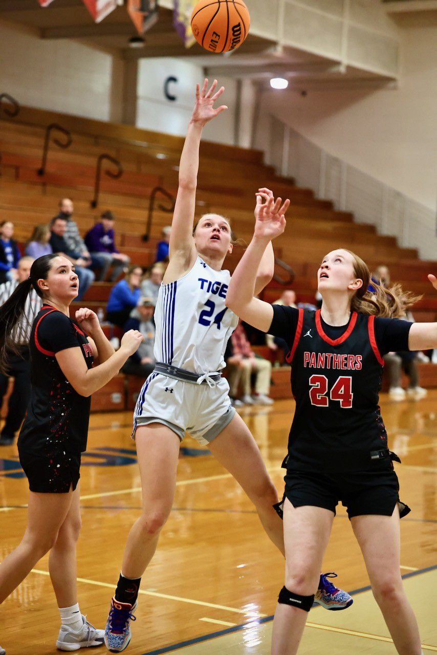 Princeton's Keighley Davis shoots over E-P's Eden Johnson in Tuesday's game at Prouty Gym. The visiting Panthers won 51-40.