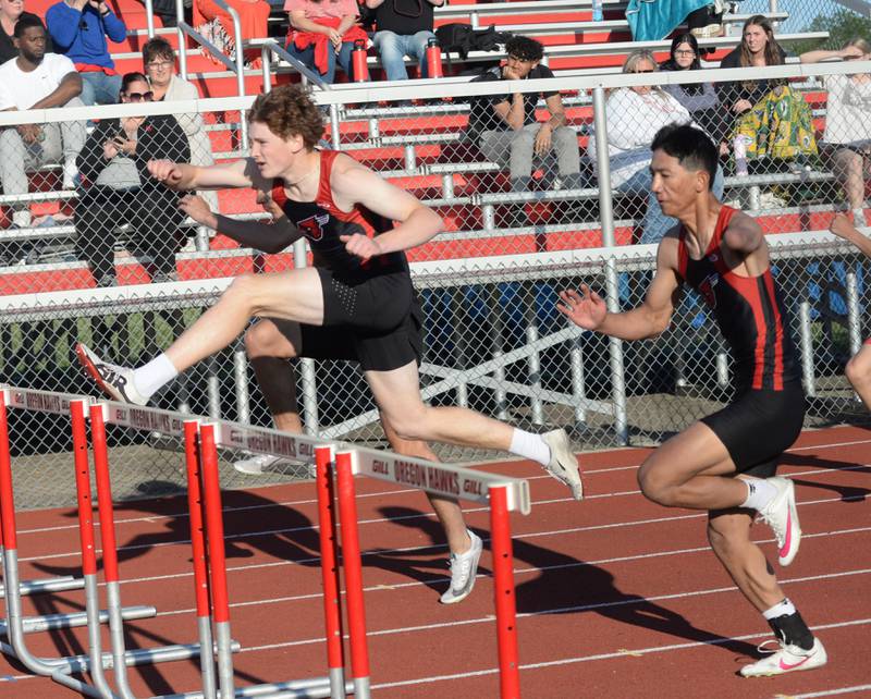 Forreston's Eli Ferris (center) and Lucas Nelson (right) race Winnebago's Drew Intravaia (left) in the 110 hurdles at the 1A Oregon Sectional at Landers-Loomis Field on Friday, May 23, 2025. All three advanced to the state meet at Eastern Illinois University with Ferri finishing first, Intravaia second, and Nelson third.