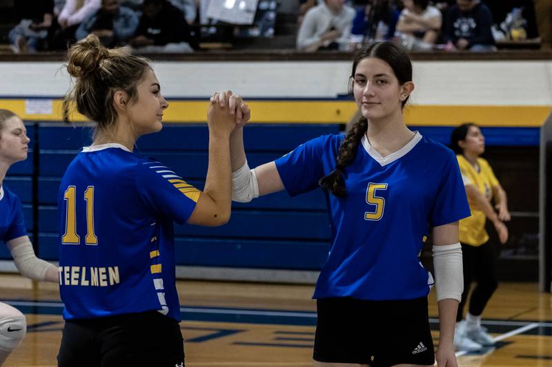 Joliet Central's Alivea Gonzalez subs in for Mickalaynuh Wollenzien during a varsity volleyball game against Illinois Mathematics and Science Academy at Joliet Central on Oct. 20, 2025.