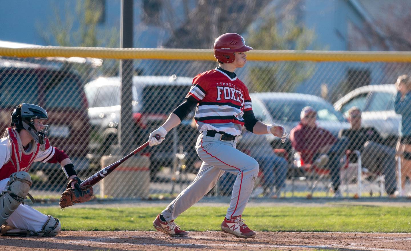 Yorkville's Gavin Dobbels (3) singles against Yorkville during a baseball game at Plainfield North High School on Thursday, April 21, 2022.