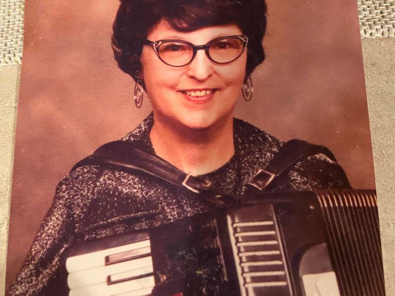 Joyce Piercy with her accordion.