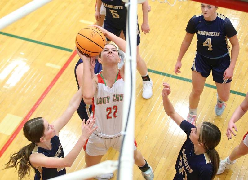 L-P's Brianna Ruppert eyes the hoop as Marquette defenders run to the play on Saturday, Jan. 4, 2025 in Sellett Gymnasium at L-P High School.