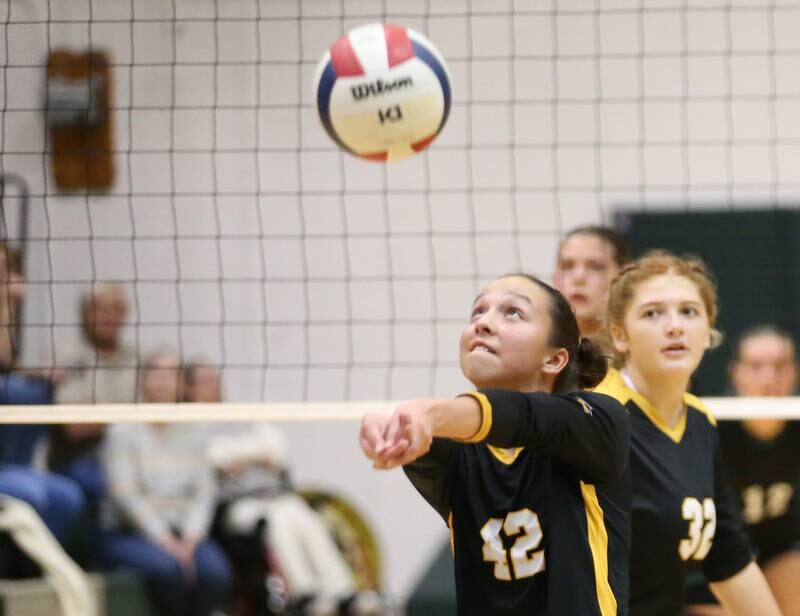 Putnam County's Eme Bouxsein bumps the ball to the front of the net for teammate Maggie Sprat on Tuesday, Sept. 24, 2024 at St. Bede Academy.