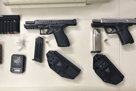 Illegal drugs, guns seized in separate house searches; 2 charged with multiple felonies, Aurora police say 