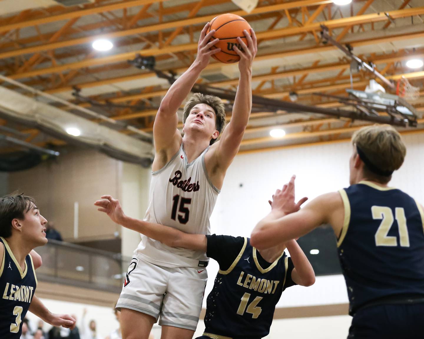 Bradley-Bourbonnais's Nick Allen (15) grabs a rebound during the WJOL Thanksgiving Classic championship game Saturday, Nov. 30, 2024, in Joliet.