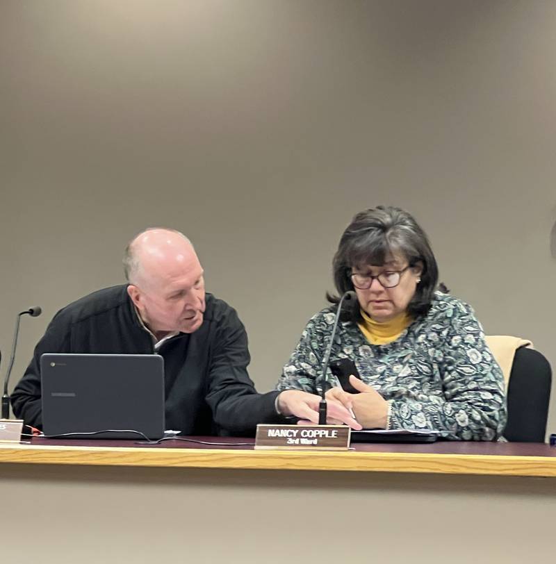 Third Ward Alderpersons Marvin Barnes and Nancy Copple prepare for a Sycamore City Council meeting on Nov. 18, 2025.
