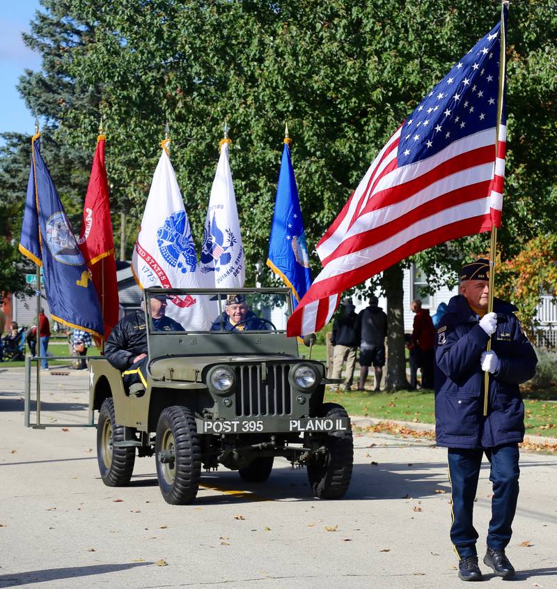 The Color Guard of the Plano American Legion Post 395 leads off the Plano High School Homecoming Parade on Saturday, Oct. 7, 2023 in Plano.