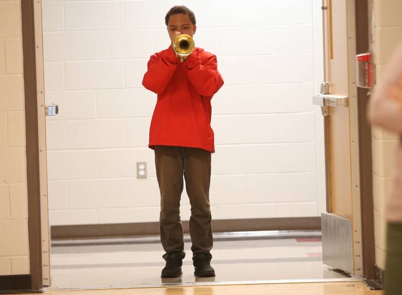 Bently Hughes plays Taps during the annual Veterans Day Program on Monday, Nov. 11, 2024 at Parkside Middle School in Peru.