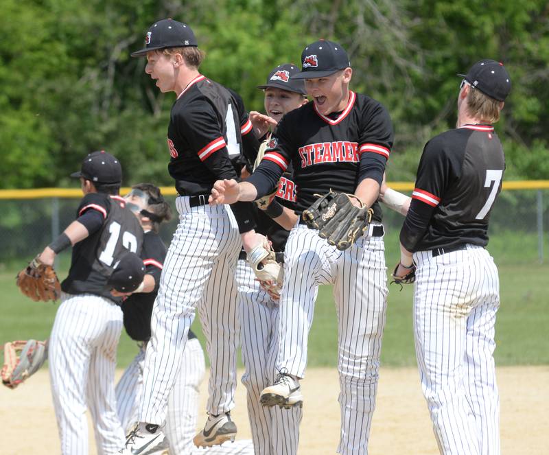 The Fulton Steamers celebrate after the final out beating Forreston 7-4 to win the 1A Amboy Regional on Saturday, May 24, 2025.