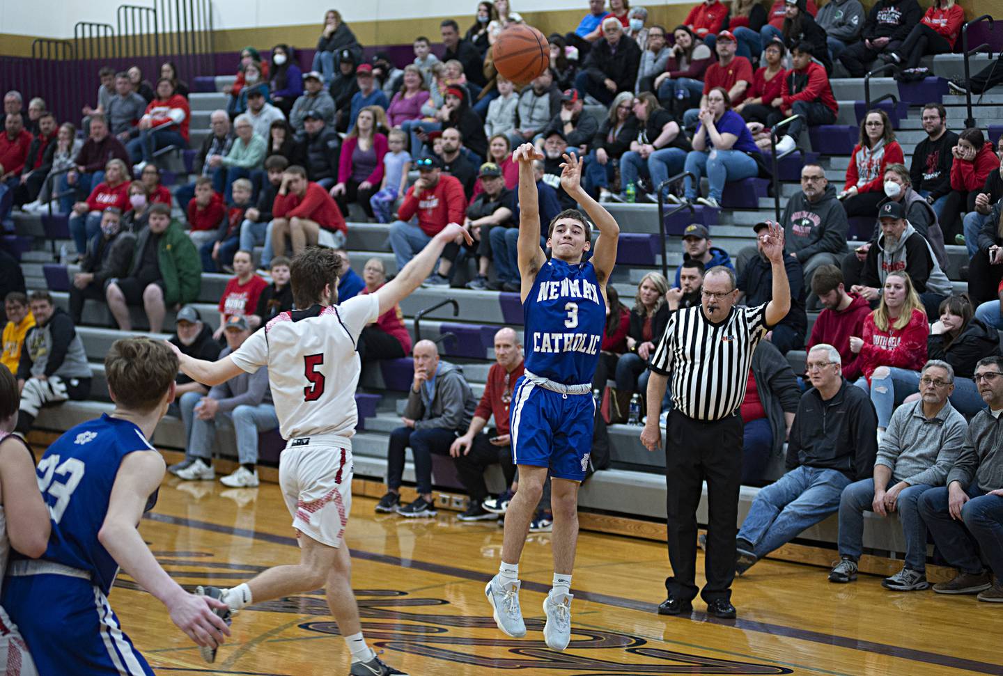 Newman's Ayden Batten drains a three pointer against South Beloit in a sectional semifinal Wednesday, March 2, 2022.
