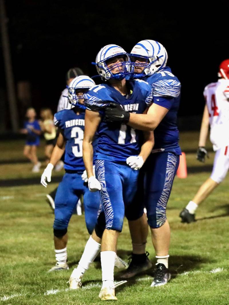 Noah LaPorte and the Tigers react after his 30-yard reception to momentarily give the Tigers a 21-19 lead over Morrison with 45 seconds left Friday.