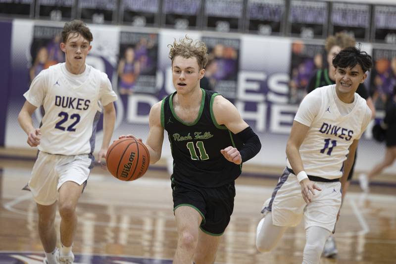 Rock Falls’ Gavin Sands drives to the hoop against Dixon Tuesday, Feb. 7, 2023.