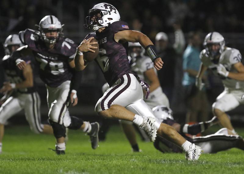 Prairie Ridge's Luke Vanderwiel runs for a touchdown during a Fox Valley Conference football game against Cary-Grove on Friday, Sept. 27, 2024, at Prairie Ridge High School.