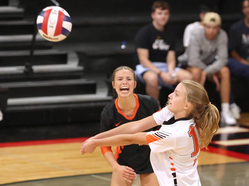 DeKalb's Megan Gates bumps the ball as Addy Levine lets her know it's in during their match against Indian Creek Tuesday, Sept. 6, 2022, at Indian Creek High School in Shabbona.