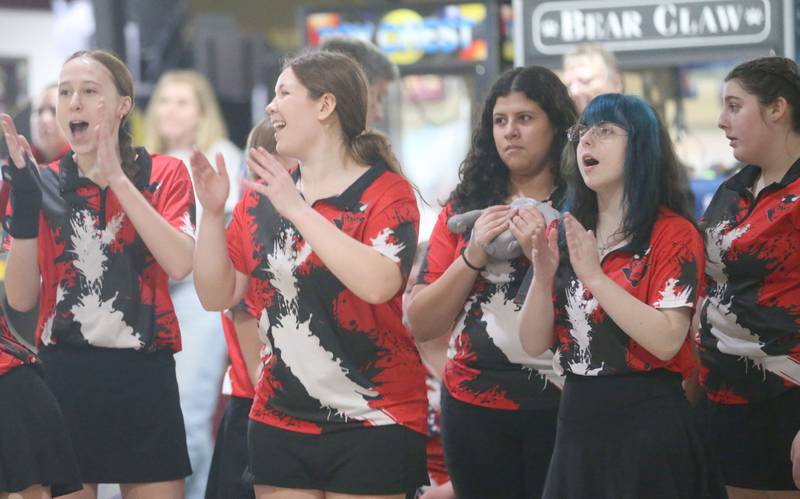 Members of the Hall girls bowling team (from left) Alyssa Edwards, Ava Diaz, Anali Rea, Raigan Carr and Payton Miller, cheer on the Lady Devils during the IHSA girls bowling Regional meet on Friday, Feb. 6, 2026 at the Illinois Valley Super Bowl in Peru.