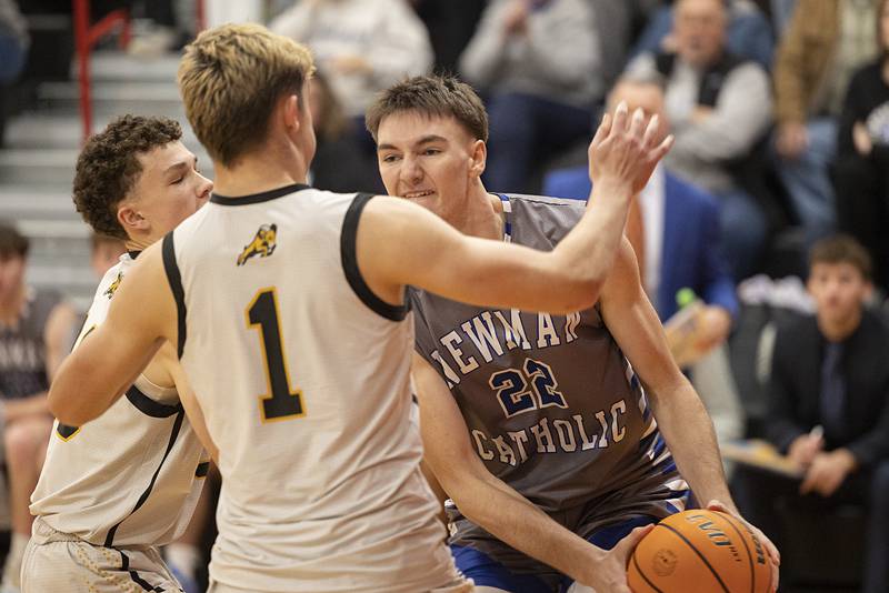 Newman’s Ashton Miner looks to make a play against Riverdale Tuesday, Dec. 30, 2025, in the final of the boys Cliff Warkins Basketball Tournament at Erie High School.