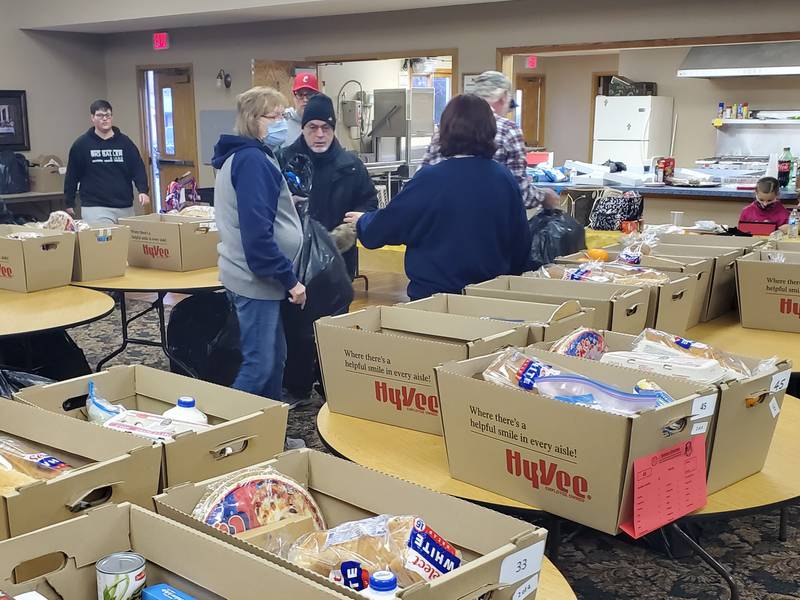 While many take the opportunity to get some extra sleep in the early Saturday morning hours, many organizers and volunteers of the Putnam County Food Pantry were hard at work handing out gifts and food to those in need across the Illinois Valley.