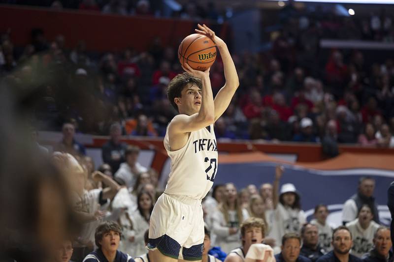 New Trier’s Logan Feller puts up a three pointer against Benet Academy Friday March 10, 2023 during the 4A IHSA Boys Basketball semifinals.