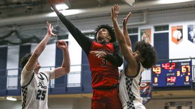 Photos: Bolingbrook vs. Oswego East boys basketball