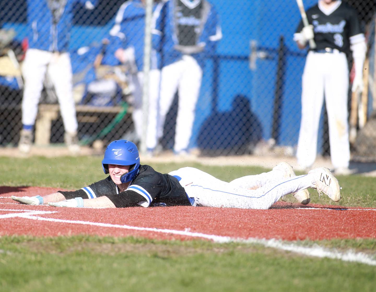 Burlington Central’s Wagner Viebrock slides safely into home plate during a game against St. Charles North on Tuesday, April 8, 2025 at Burlington Central.