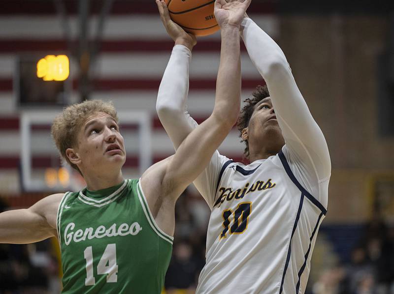 Sterling’s Koby Bell works against Geneseo’s Jack Kreiss Friday, Dec. 5, 2025.
