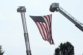 Area firefighters honor retired Oswego firefighter after his passing 