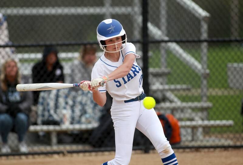 St. Charles North's Ivy Gleeson hits a double during a game against Lake Park on Wednesday, April 30, 2025 in St. Charles.