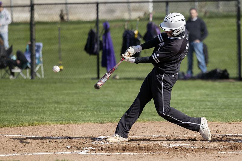 Rock Falls’ Brady Richards drives the ball against Dixon on Tuesday, April 18, 2023.