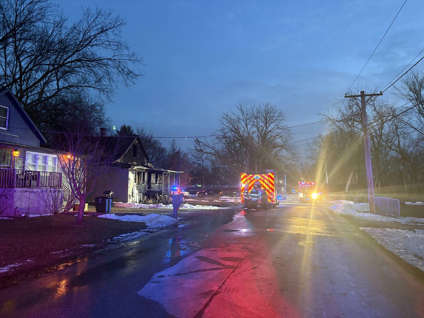 A home stands badly damaged from a fire on Dec. 19, 2025, in the Lotus Woods neighborhood near Spring Grove.