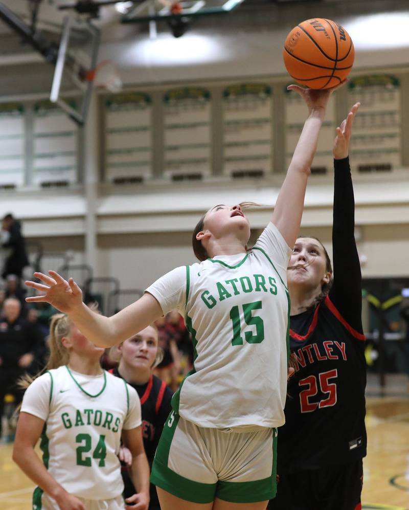 Crystal Lake South's Tessa Melhuish battles with Huntley's Evelyn Freundt for a rebound during a Fox Valley Conference girls basketball game on Friday, Jan. 30, 2026, at Crystal Lake South High School.