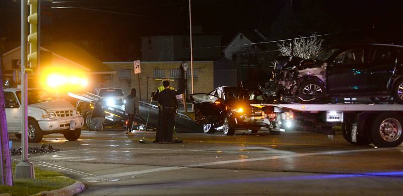 Emergency personnel respond to a three-vehicle crash about 5 p.m. Tuesday, Dec. 5, 2023, at the intersection of North Galena Avenue and Court Street in Dixon.